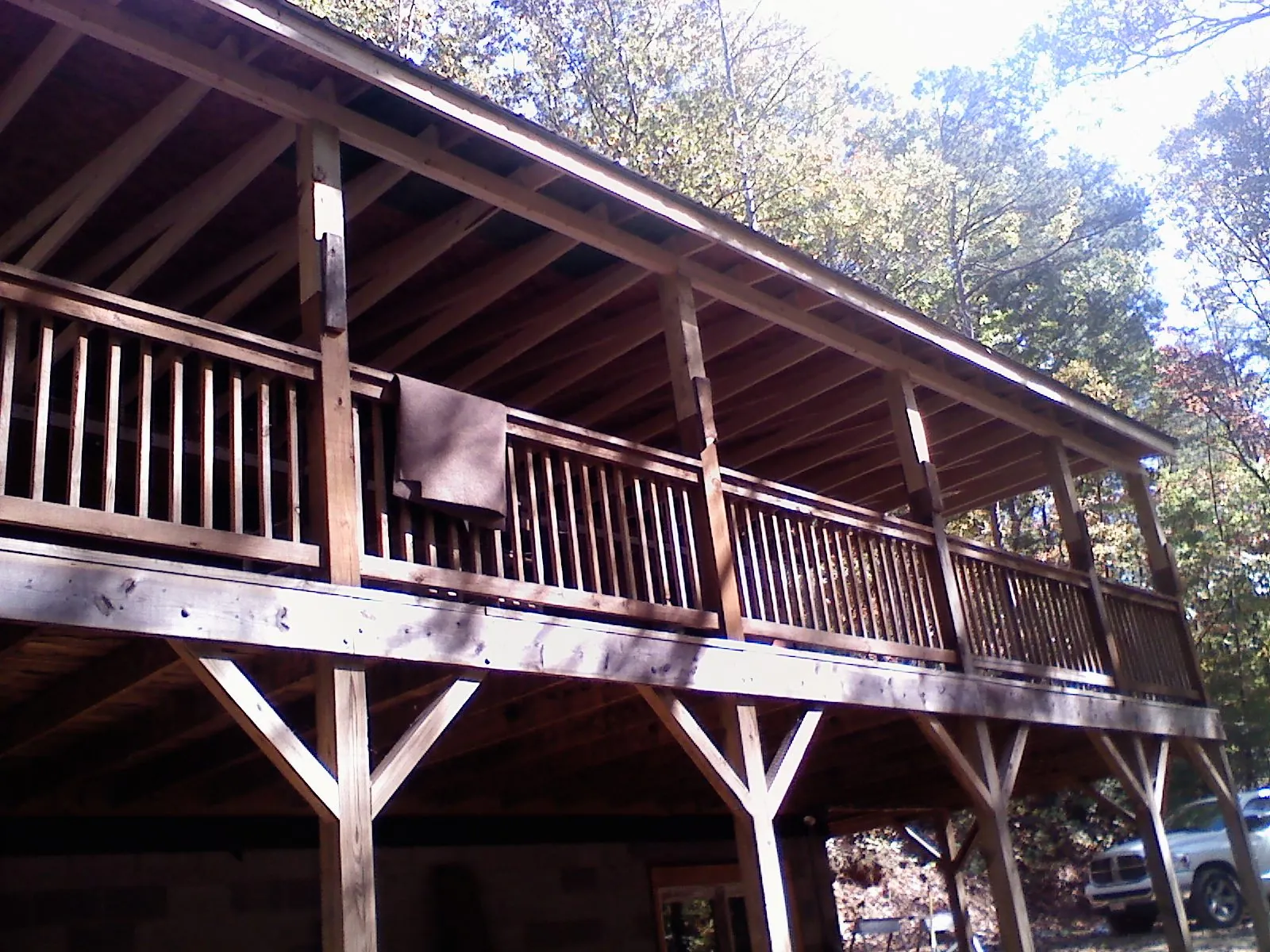 Timber framing under a new elevated porch and deck — Roof Leak Repair in North Walpole by Roofing Brothers